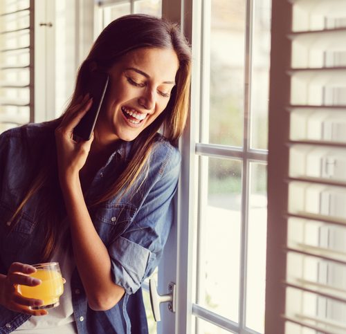 Happy woman on the phone