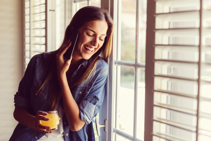 Happy woman on the phone